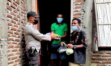 Peduli-Warganya-Yang-Terpapar,-Bhabin-Aipda-Wayan-Aryasa-Berikan-Bantuan-Sembako