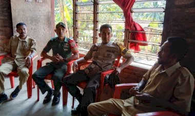Tingkatkan-Sinergitas,-Bhabinkamtibmas-dan-Babinsa-Melaksanakan-Komsos-Dengan-Perangkat-Desa