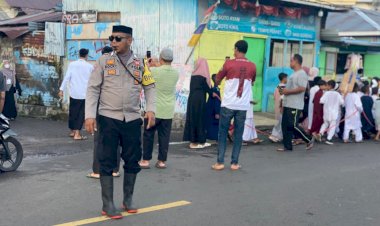 Bhabinkamtibmas-Bripka-Ruslan-Kawal-Pawai-Tahrib-Ramadhan-1446-H