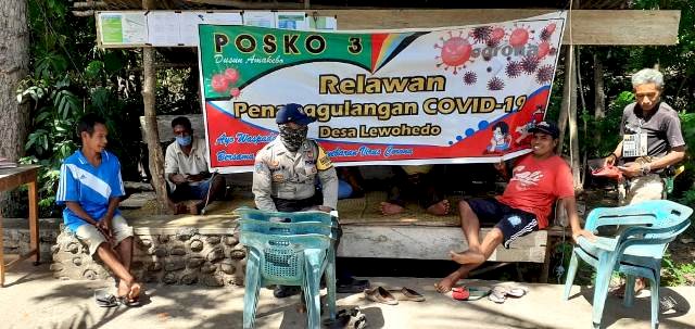 Pantau Pos Covid, Bripka Irwan Himbau Warga Taati Protokol