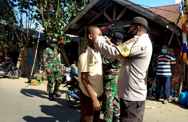 Bhabinkamtibmas Bripka Rofinus Naja Himbau Warga Untuk Patuhi Protokol Kesehatan